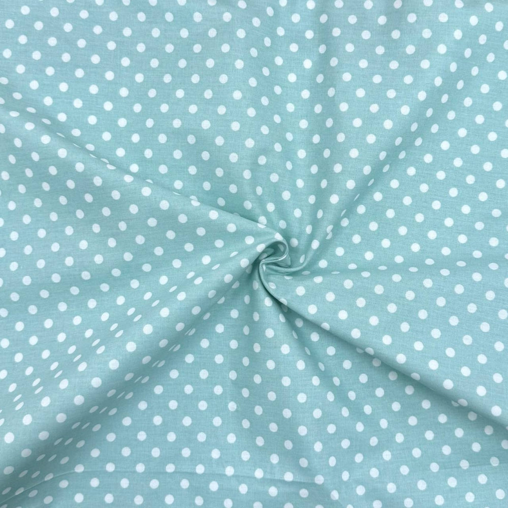 Nepremokavá podložka pre bábätko 50 × 80 cm biely hrášok na mätovej