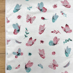Nepremokavá podložka pre bábätko 50 × 80 cm Motýliky mätový/ružový