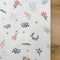Nepremokavá mušelínová podložka 45 × 75 cm vetvičky broskyňa-mäta