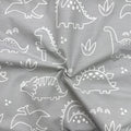 Nepremokavá podložka popelín/membrána 45 × 75 cm Dino na sivej
