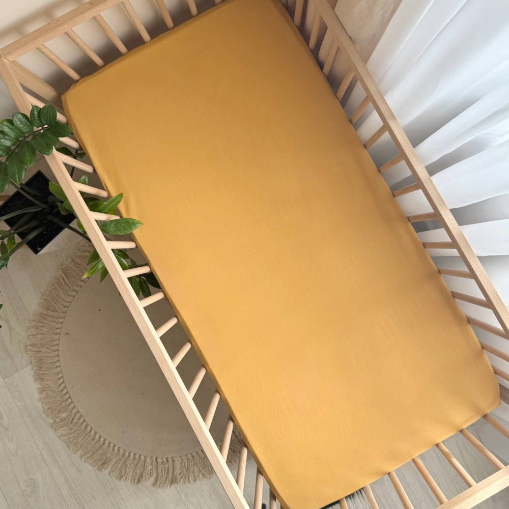 Plachta z pranej bavlny do postieľky 60 × 120 cm – horčicová