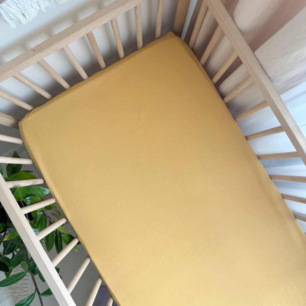 Plachta z pranej bavlny do postieľky 60 × 120 cm – horčicová