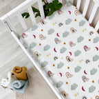 Flanelová napínacia plachta do postieľky 120 × 60 cm – Dúhy v obláčikoch mäta