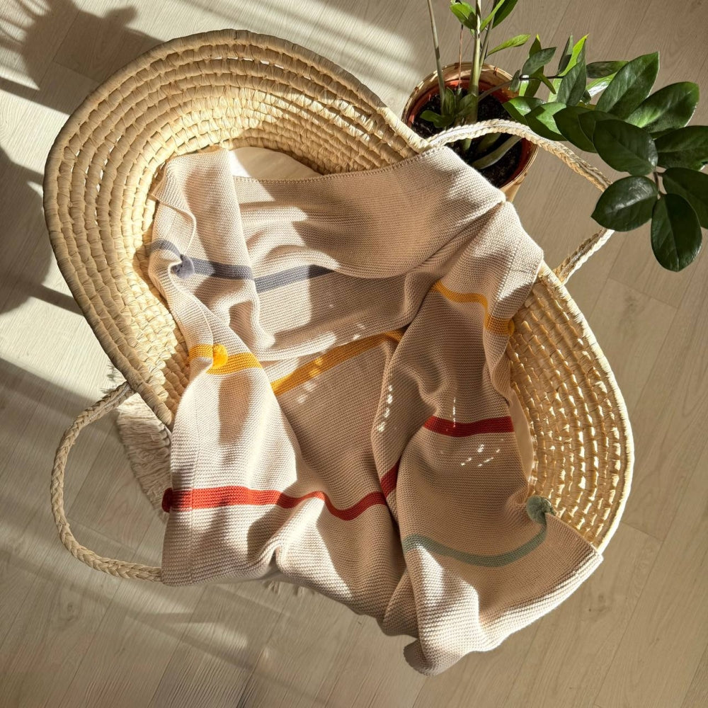 Pletená deka pre bábätko s brmbolcami
