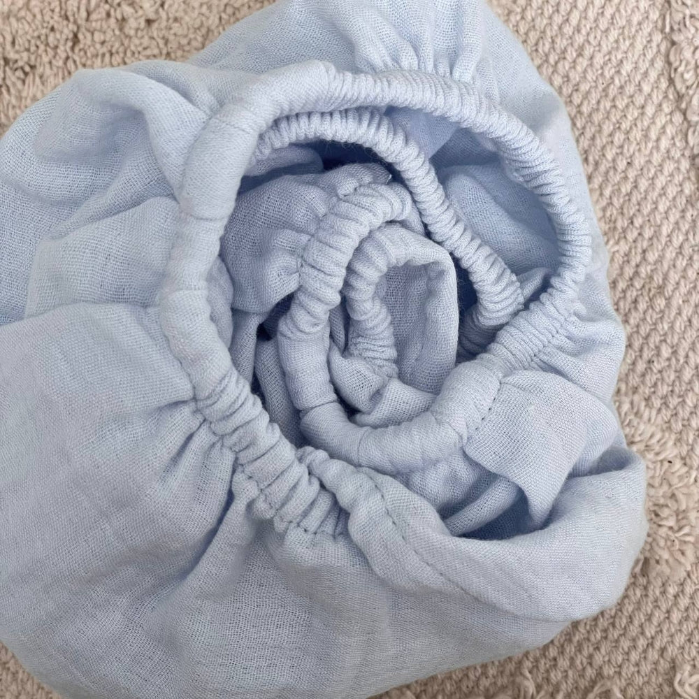 Mušelínová plachta do kočíka bledomodrá